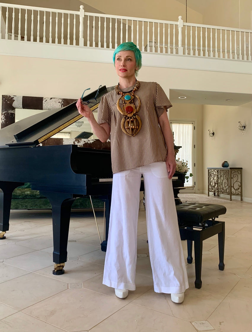 Does your closet make you dance? Our brand designer and stylist Inga Goodman demonstrates how easily and quickly you too can get in style just by pairing three items together, a pair of linen pants, our Riviera Top and your favorite accessory. So much to look forward to!