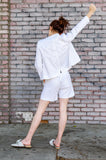Back view  of our unique Overlapping Front Jacket paid with matching Scallop Hem Shorts. Have you seen that cute back seam shaped detail?