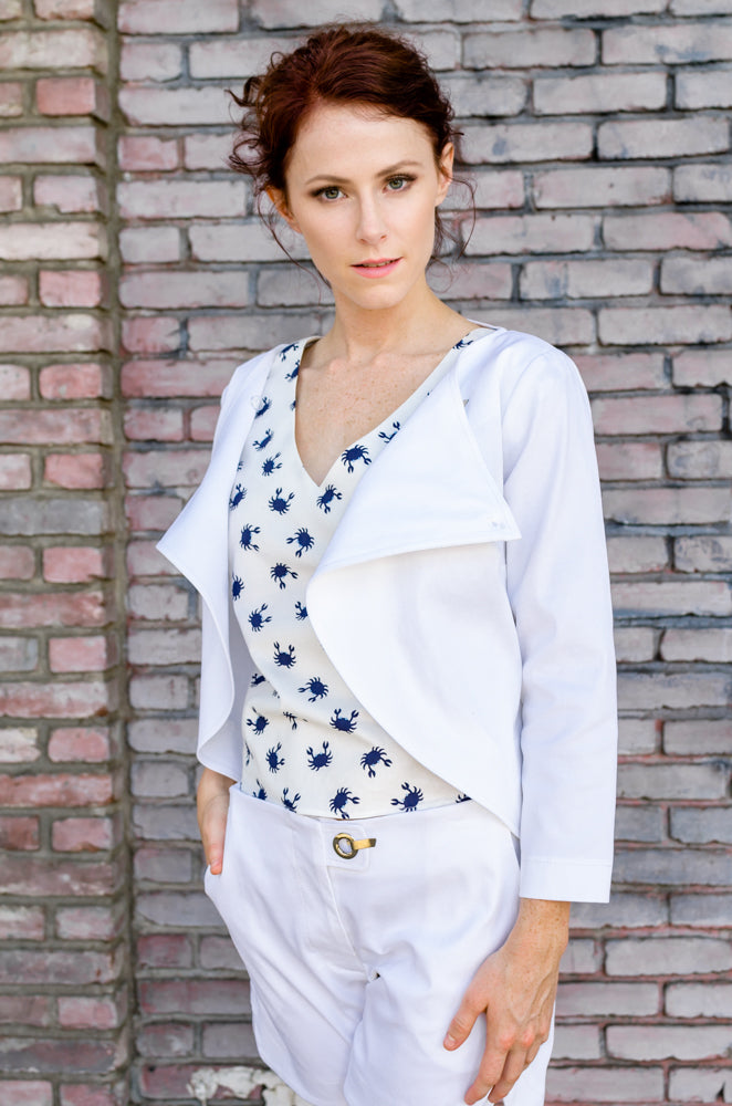 What a perfect summer combination! Overlapping Front Jacket and Scallop Hem Shorts in White paired with our beloved Boxy Top with Tie in Navy Crab! Where would you wear this perfect combo?