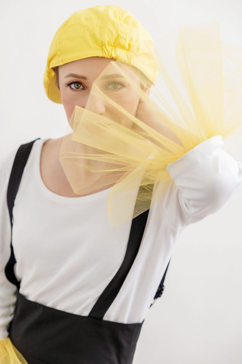 Our creative director Inga Goodman is modeling her new design - White Jersey Long Sleeve Top with decorative cuffs made out of contrast fabric. It looks fabulous and so much fun paired with black bottoms and offers just enough contrast to draw others' attention. We can't wait to send you this beautiful piece in Sunny Side Up color. Pre order yours now!