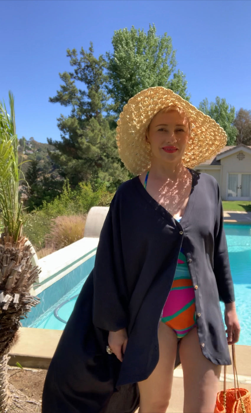 Gained a few extra pounds? No worries! We got your covered. No need to sweat at the gym, our one size fits all kaftan can hide it all. it's a post-civid chic that allows women to feel comfortable and beautiful regardless! None sheer fabric helps, and navy color goes with everything. Feel beautiful and look chic and rich right away in our one of a kind duster! It's on sale and going fast! Get yours now.