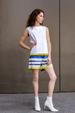 Jessie is modeling our Summer Beach Shorts made out of Italian light weight poplin in Blue and Yellow Stripes. Let the stripes spark your summer, strike a pose!