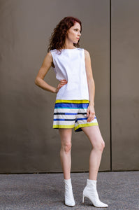 Jessie is modeling our Summer Beach Shorts made out of Italian light weight poplin in Blue and Yellow Stripes. Let the stripes spark your summer, strike a pose!