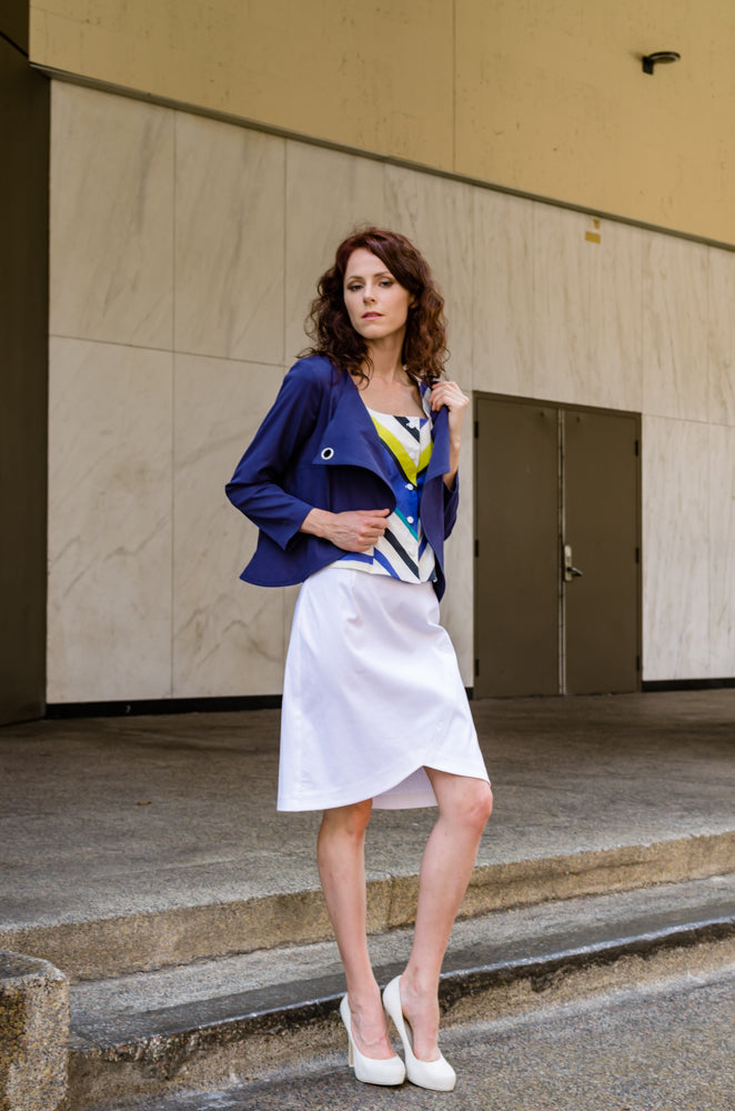 Wear it close or wear it open! Our Overlapping Front Jacket looks equally great! Try it with our Cap Sleeve Corset Top in Yellow Stripe and Pencil Skirt with Scallop in White for extra flair!