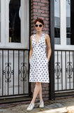 Our model, Jessie is wearing this Vintage inspired piece - wide shoulder strap dress in adorable Blue Crab print. Ruched bra like shaped top, high waisted, A-shape, knee length dress with side seam pockets definitely assure comfort and chic for you this summer. And those straps crossing in a back are complement worthy for sure!  Cheers to summer!