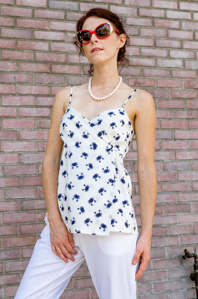 Be aware of what you wear! In our summer Ankle Wide Hem  Pants and Wrap Empire Tank Top combination you may look too cute to stay home! Pearl beads and PPE are also required this summer!