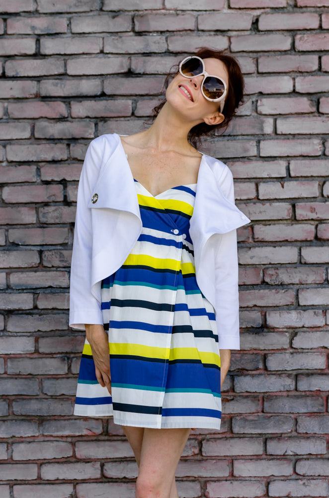 Jessie is modeling Wrap Empire Mini Dress in Yellow Stripe and Overlapping Front Cotton Cropped Jacket in White from our summer collection. The mood is - I feel good and can't help it, but smiles!